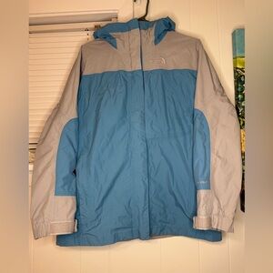 The North Face Girls Blue and Gray rain jacket